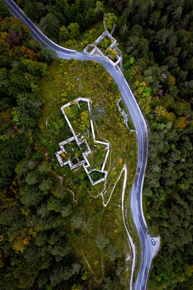 Aerial of forest, road and star-fort ruins