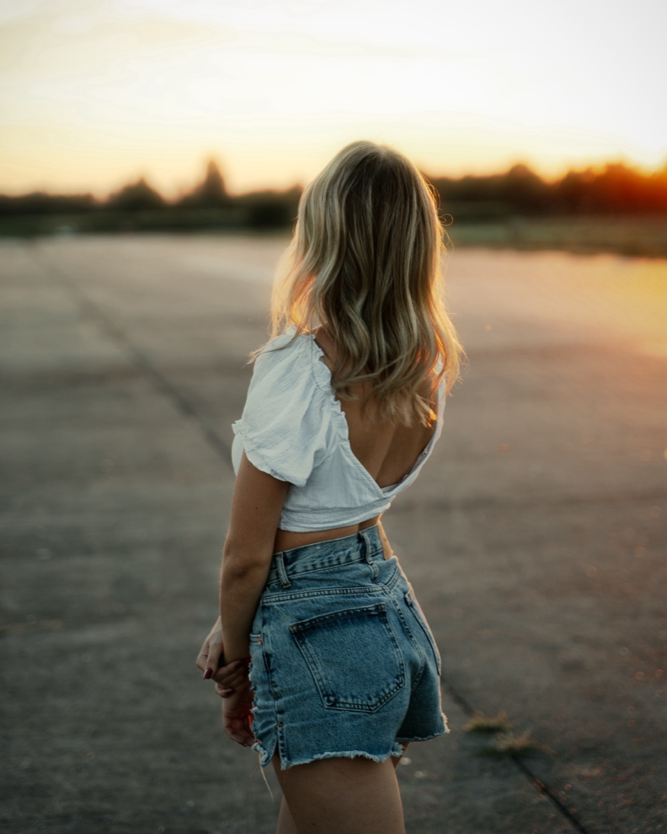 Portrait walking into the sunset, denim